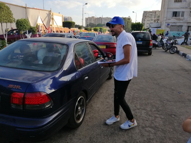 فريق متطوع من الشباب للتسجيل بمنظومة التأمين الصحى الشامل ببورسعيد.. صور