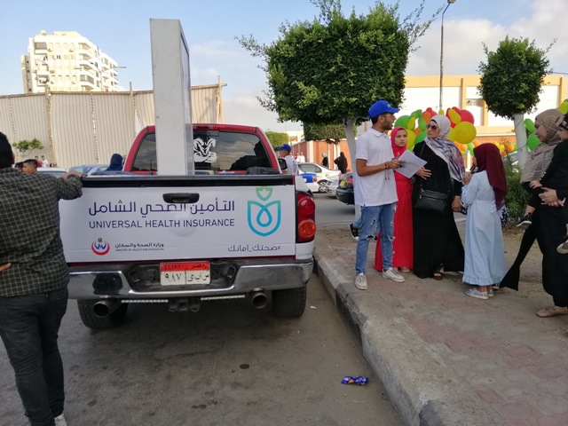 فريق متطوع من الشباب للتسجيل بمنظومة التأمين الصحى الشامل ببورسعيد.. صور