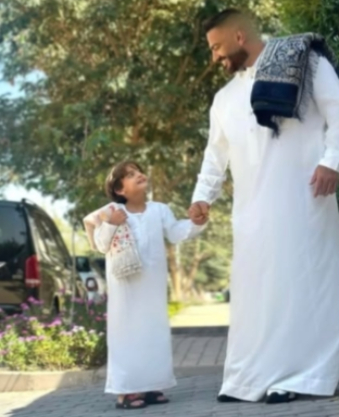 تامر حسني ونجله آدم 