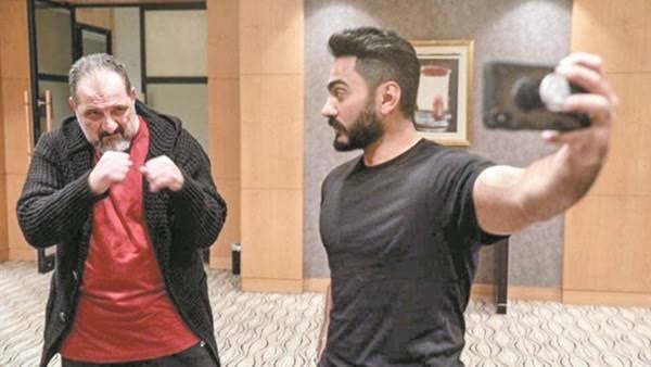 بالصور : تامر حسنى ملاكم يخطف الانظار على السوشيال ميديا