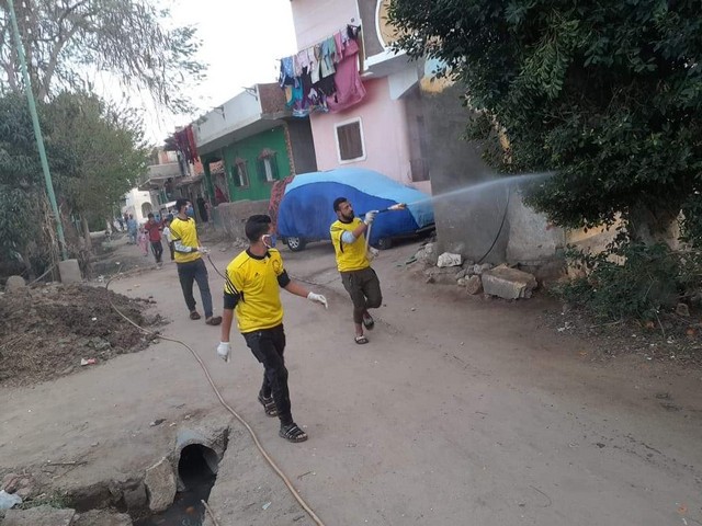 جمعية النهوض بالريف تقيم منافذ بيع مخفضة و تطهر شوارع بني سلامة 