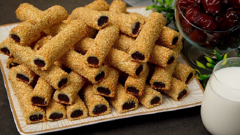 اصابع التمر بالسمسم