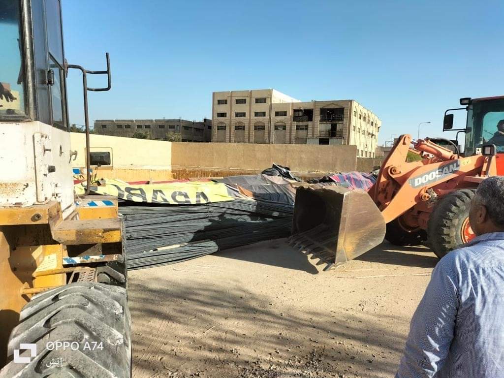 جهاز العبور يشن حملة اشغالات ليلية بمعاونة شرطة المرافق