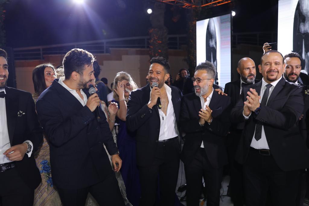 محمد حماقى وكوكبة من نجوم الفن يحتفلون بزفاف نجل الفنان مصطفى قمر.. صور 