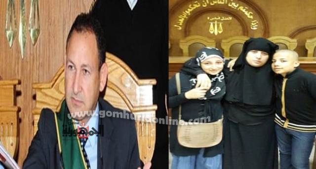 الأم تحتضن طفليها بعد حكم المستشار خفاجى