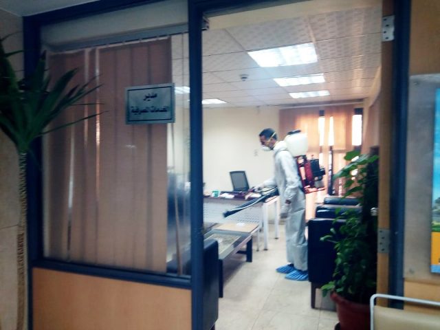 غلق فرع البنك الأهلى بدمنهور بعد أصابة أحد العاملين به بكورونا.. بالصور