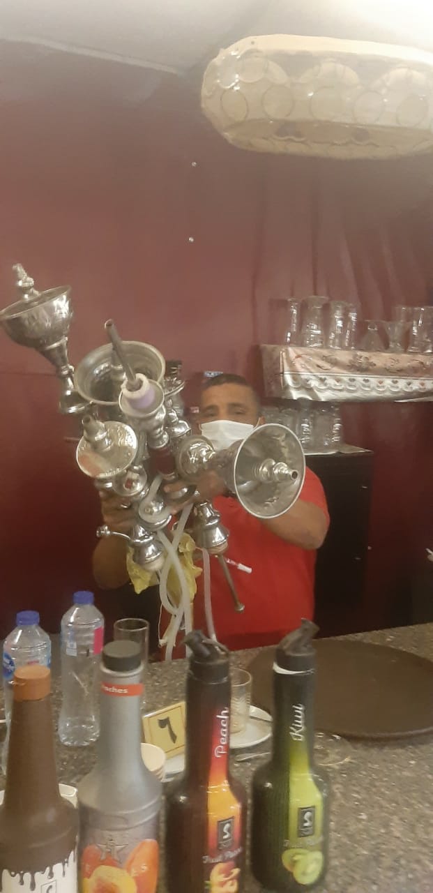 محاضر بالجملة لمقاهى وورش ومحال خالفت مواعيد الغلق ومصادرة ٧٨٥ شيشة