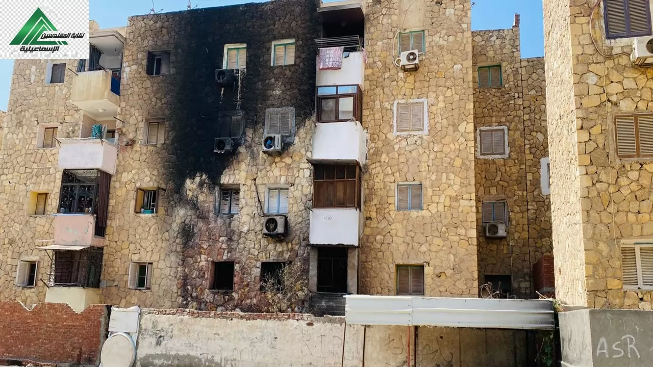 نقابة مهندسين الإسماعيلية تعاين الحالة الإنشائية لعقار محترق..صور