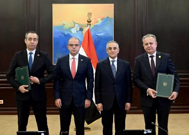 وزيراالعدل والاستثماروالتجارة الخارجيةيشهدان توقيع بروتوكول تعاون