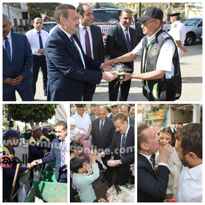محافظ المنوفية يوزع الورد والكعك على المواطنين وعمال النظافة وأفراد المرور