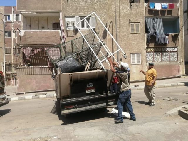 جهاز العبوريشن حملة اشغالات مكبرة ويغلق7 وحدات سكنية بالتعاون مع شرطة التعمير..بالصور