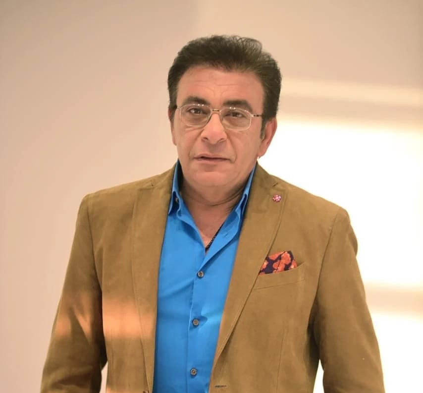 الإعلامي عاطف كامل