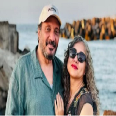 على الحجار وزوجته