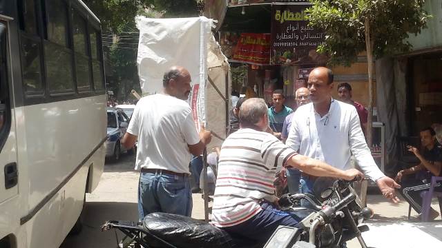 ازالة ٢٨٨ حالة اشغال وتحرير ١٣ محضر بيئة فى حملة فى بنى سويف.. بالصور