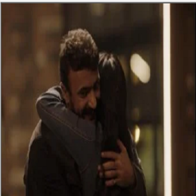 أحمد العوضي وكارولين عزمي 