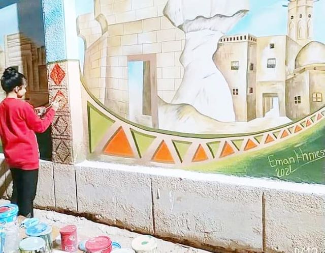 صحوة فنية لتجميل اسوار المدارس والمنشآت بلوحات جدارية فى الواحات.. بالصور