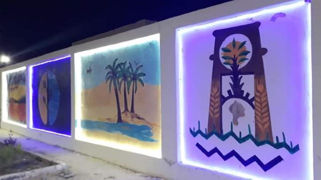صحوة فنية لتجميل اسوار المدارس والمنشآت بلوحات جدارية فى الواحات.. بالصور