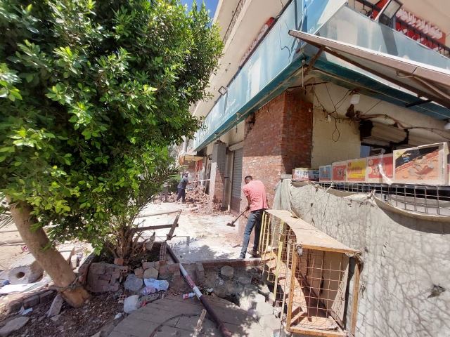النجار: تنفيذ ٥٧٠ ازالة وغلق بمدينة 6 أكتوبر بالتعاون مع الشرطة.. صور