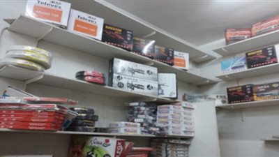 ضبط مالك محل بحوزته 23 ريسيفر لفك شفرات القنوات الفضائية بالجيزة
