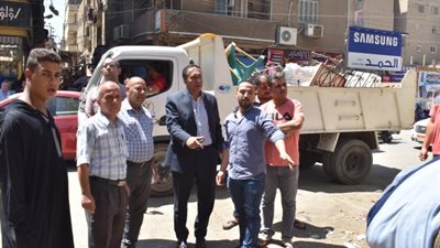 استمرار حملات الإزالة بشوارع وميادين الفيوم.. صور