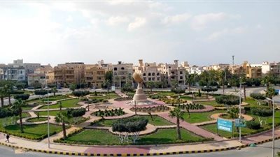 شاهد صور تطوير أهم الميادين بالشروق وزراعة 6 ألآف عود زهور.. صور