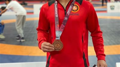 معاويه تهنئ ابن الجامعة بطل المصارعة الحرةالفائز ببرونزية أفريقيا