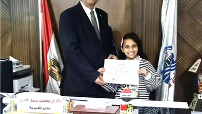 وكيل تعليم قنا يكرم بطلة الجمهورية للتايكوندو