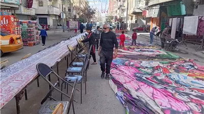 موائد الإفطار الجماعي تغزو شوارع الإسماعيلية في رمضان..صور
