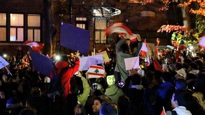 الجالية اللبنانية تنظم وقفة بالاعلام أمام برلمان كندا