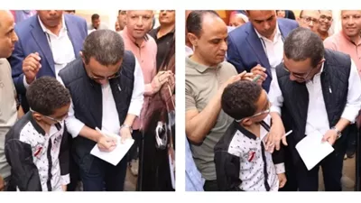محافظ المنوفية يجبر بخاطر طالب ويوقع له أوتوجراف بكراسته بالشهداء