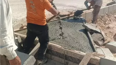 جهاز القاهرة الجديدة يرفع كفاءة الطرق في بيت الوطن