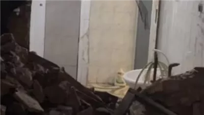 أنهيار جزئي لعقار مكون من أربعة طوابق فى روض الفرج