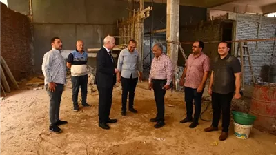 عبد المولى يتفقد مقرفرع البنك الأهلي المصري بمجمع الخدمات المركزى