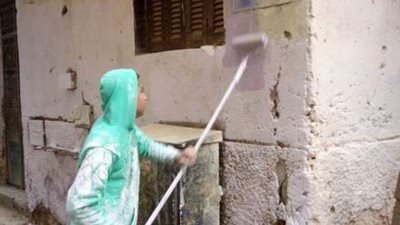 حملة لأهالى امبابة لتجميل عقارات المنطقة