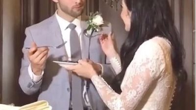 بالصور: عريس يتعرض لموقف محرج أثناء تقطيع تورتة الزفاف