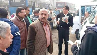 نقل موقف عشوائى امام مستشفى ام المصريين بالجيزه لموقف المنيب