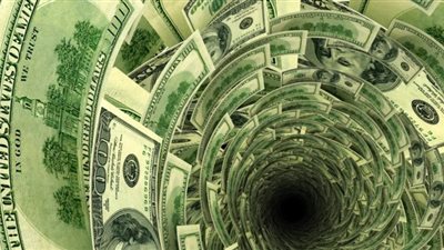 الدولار يعاود الهبوط مع تحسن الثقة بسوق الأسهم والأنظار على مجلس الاحتياطي