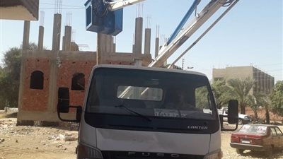 جهود مكثفة لرفع كفاءة الإنارة العامة بمدينة جهينة بسوهاج ...صور