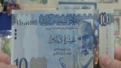 بدء سريان سعر صرف الدينار الليبي أمام الدولار الأمريكي اعتبارا من 3 يناير