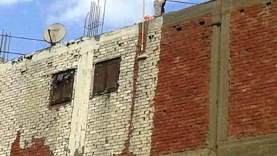 حي العجوزة يبدأ في طلاء العقارات المطلة على الطريق الدائرى بلون موحد