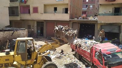 محافظة الجيزة تكثف حملاتها لرفع مخلفات القمامة بمناطق الزرايب بالعجوزة وكرداسة