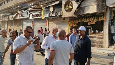 حملات مكثفة بالجيزه على المقاهي والاشغالات ..صور