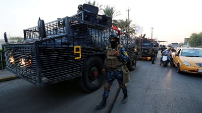 اشتباكات بين قوتين من الشرطة والحشد الشعبي جنوبي العراق