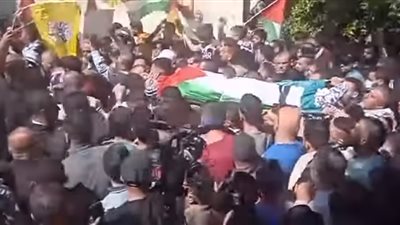 مراسم عسكرية في تشييع جثمان المُستشار القانوني الفلسطيني الذي استشهد في نابلس اليوم
