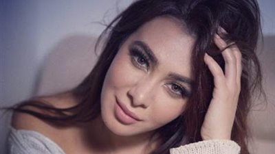 ميرهان حسين تشعل السوشيال ميديا بفستان ابيض .. صور