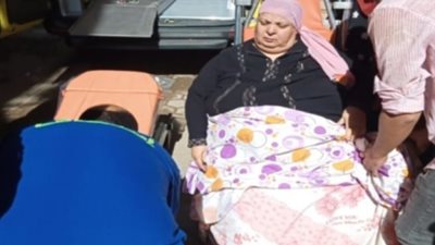 أمن القاهرة يساعد سيدة مريضة وينقلها للمستشفى