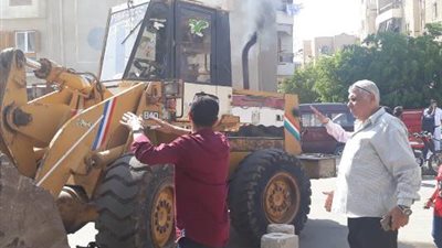 جهاز مدينة العبور يشن حملة إزالة الإشغالات بأحياء العبور ..صور