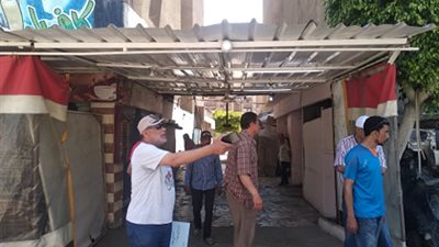 تنفيذ قرارإدارى بإزالة سقيفة مخالفة بعرض الشارع لأحد الكافيهات بضواحى بورسعيد