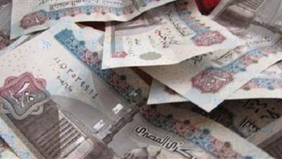 كتابة عبارات تذكارية على العملات الورقية..ما حكمه؟