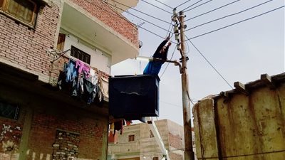 رفع ٧٥ طن قمامة وصيانة ٣٥ كشاف إنارة بالتل الكبير